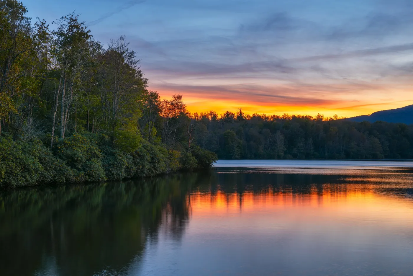 Sunset over Virginia lake and forest